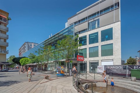 Concrete buildings with large glass façade and fountain, Dornbirn, Vorarlberg, Austria