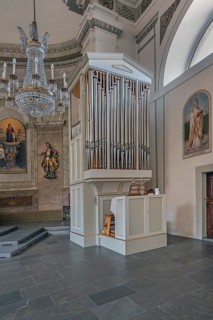 The Roman Catholic parish church of St Martin, interior with side organ, wall frescoes and crystal