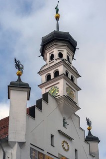Town hall tower with clocks, metal eagles, Justitia and bronze trombone blower, Kempten, Allgäu,