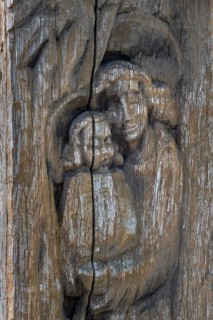 Wooden grave column with carving, mother and child, catholic cemetery, Kempten, Allgäu, Bavaria,
