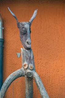 Whimsical tree sculpture, donkey's head with long ears at the Kultur-Wirtschaft in the Allgäuhalle,
