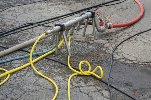 Distribution pipe with tangle of water hoses, Circus-Krone, Kempten, Allgäu, Bavaria, Germany