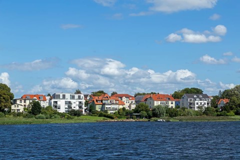 Residential area on the eastern bank of the Unterwarnow, Rostock, Mecklenburg-Vorpommern, Germany