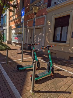 Street in the old town, car park for scooters, e-scooters, sunshine, Brühl, North Rhine-Westphalia,