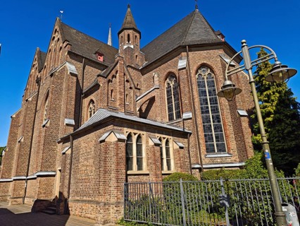 Old town with catholic church St. Margareta, brick building, architecture, religion, lantern, tree,