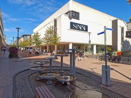 Pedestrian zone with fountain, department stores', pedestrians, traffic-calmed, old town,