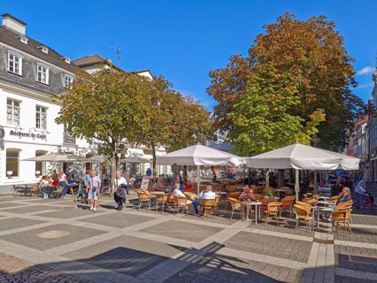 Pedestrian zone, traffic-calmed, café, trees, pavement, old town, architecture, shops, people, blue