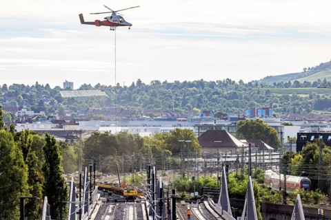 Track construction from the air. At Bad Cannstatt railway station, a transport helicopter