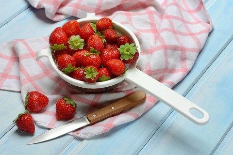 Strawberries in a colander, Fragaria x ananassa