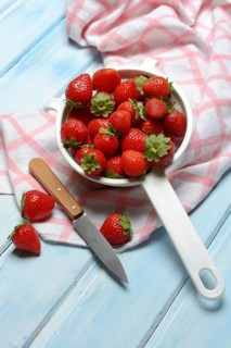 Strawberries in a colander, Fragaria x ananassa