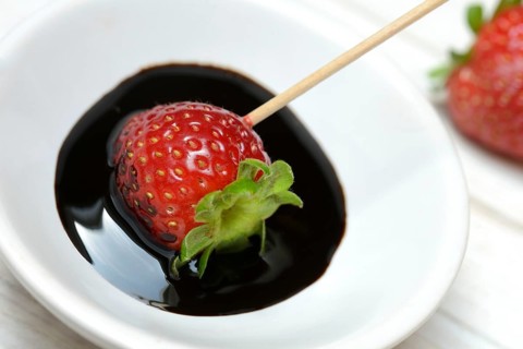 Strawberry and crema di balsamico in small bowls