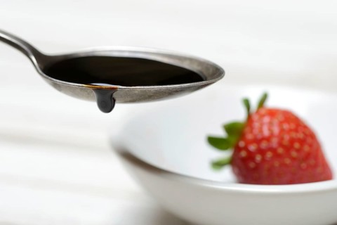 Spoon with Crema di Balsamico, balsamic vinegar