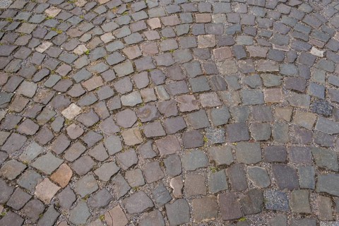 Cobblestones in a curved pattern and earthy colours, North Rhine-Westphalia, Germany
