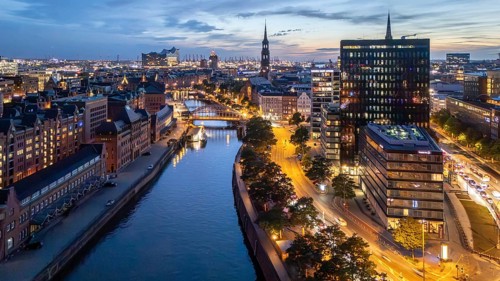 Aerial view of Hamburg's Speicherstadt warehouse district at blue hour with a view of the Zollkanal