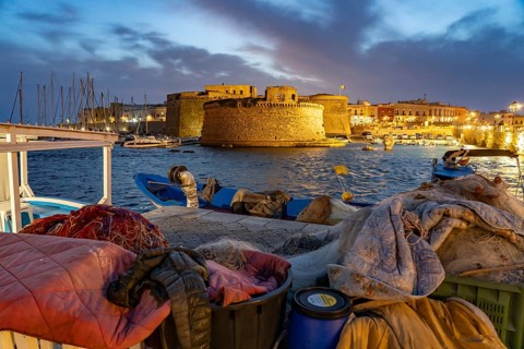 The Castello di Gallipoli fortress at dusk, Gallipoli, Apulia, Italy