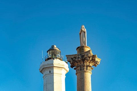 Marian column and lighthouse in Santa Maria di Leuca, Apulia, Italy