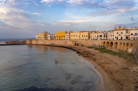 The Spiaggia della Purità city beach and the historic centre of Gallipoli, Apulia, Italy