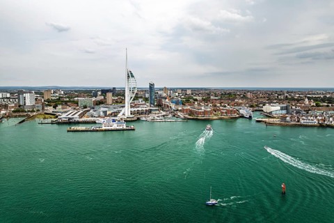 Portsmouth Harbour over Spinnaker Tower from a drone, Portsmouth, Gosport, England, United Kingdom