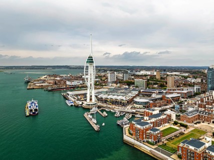 Portsmouth Harbour over Spinnaker Tower from a drone, Portsmouth, Gosport, England, United Kingdom