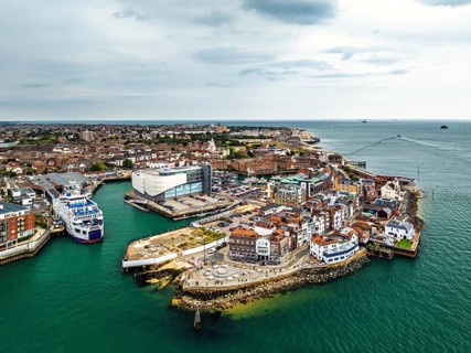 Portsmouth Harbour over Spinnaker Tower from a drone, Portsmouth, Gosport, England, United Kingdom
