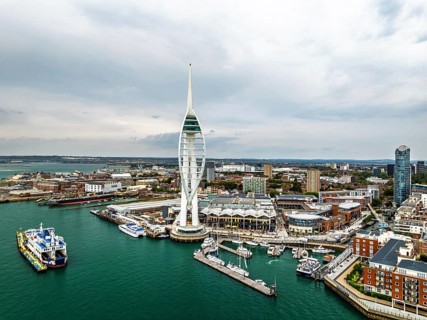 Portsmouth Harbour over Spinnaker Tower from a drone, Portsmouth, Gosport, England, United Kingdom
