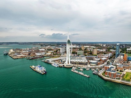 Portsmouth Harbour over Spinnaker Tower from a drone, Portsmouth, Gosport, England, United Kingdom