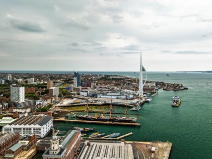 Portsmouth Harbour over Spinnaker Tower from a drone, Portsmouth, Gosport, England, United Kingdom