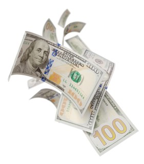 Randomly falling U.S. 100 dollar bills isolated on a white background