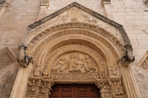 Relief above the portal of the church of Santa Maria Maggiore in Monte Sant'Angelo, Gargano,