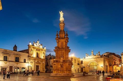 The Piazza Salandra square with the Guglia dell'Immacolata column and the Chiesa di San Trifone