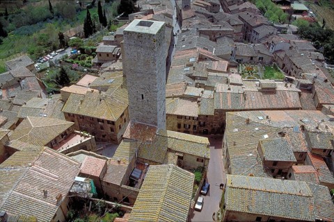 Roofscape and a gender tower of San Gimignano, Toakana, Italy