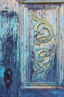 Texture and design of an old carved wooden baroque church door, Ouro Preto, Minas Gerais, Brazil