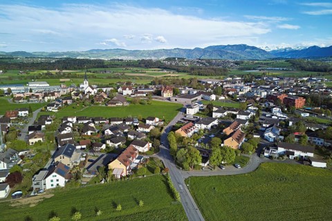 View of the village with the neighbourhood Oberdorf and the catholic parish church Mariä Geburt,