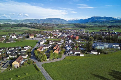 View of the village with the neighbourhood Oberdorf and the catholic parish church Mariä Geburt, in