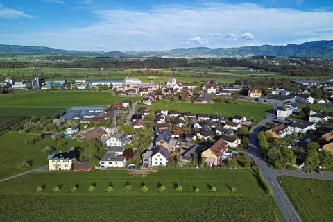 View of the village with the neighbourhood Oberdorf and the catholic parish church Mariä Geburt,