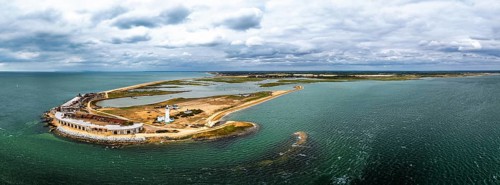 Panorama of Hurst Point Lighthouse and Hurst Castle from drone over Hurst Spit, Milford on Sea,