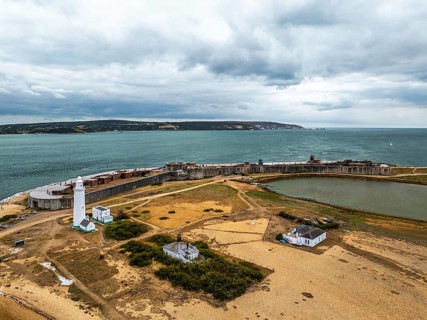 Hurst Point Lighthouse and Hurst Castle from drone over Hurst Spit, Milford on Sea, Lymington,