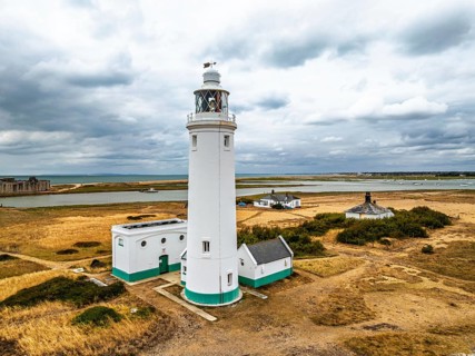 Hurst Point Lighthouse and Hurst Castle from drone over Hurst Spit, Milford on Sea, Lymington,