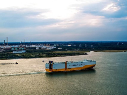 Grimaldi Lines Vehicles Carrier Grande Texas over refinery Esso Oil Terminal from drone,