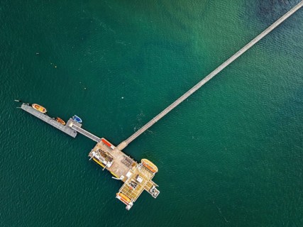 Top Down over Warsash Maritime Academy Pier and River Hamble from drone, Hamble-le-Rice, Warsash,