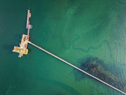 Top Down over Warsash Maritime Academy Pier and River Hamble from drone, Hamble-le-Rice, Warsash,