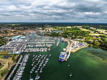 Wight Light car ferry to Isle of Wight on Lymington River and marina from drone, Lymington, New