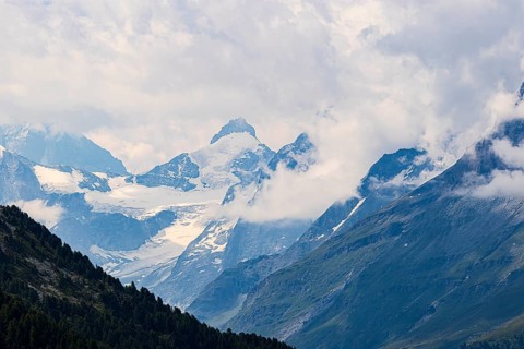 Four-thousand metre mountains and glaciers in clouds, above Zinal, Val d'Anniviers, Valais Alps,