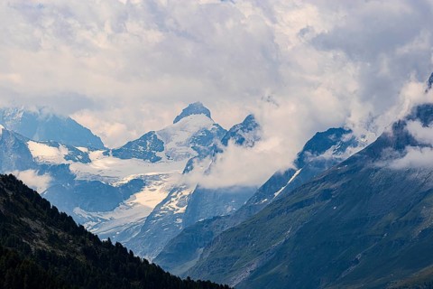 Four-thousand metre mountains and glaciers in clouds, above Zinal, Val d'Anniviers, Valais Alps,