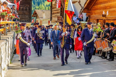 Drummers' and pipers' meeting in Mission, here the Echo des Alpes brass band marching in, led by a