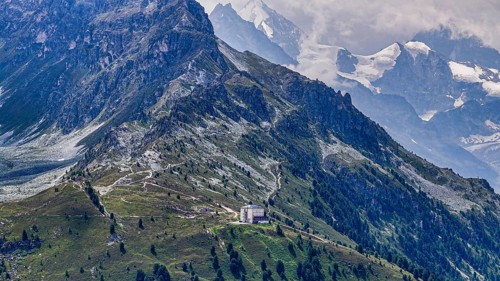 The historic Hotel Weisshorn below the Weisshorn mountain, behind the four-thousand-metre peaks and