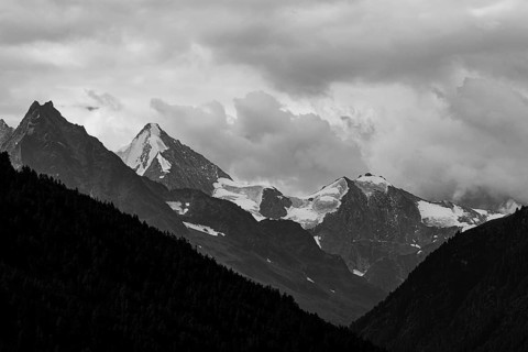 The Besso mountains with twin peaks and the Obergabelhorn, black and white photograph, view from