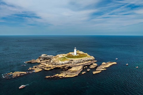 Godrevy Lighthouse from a drone, Godrevy Island, St Ives Bay, Cornwall, England, United Kingdom