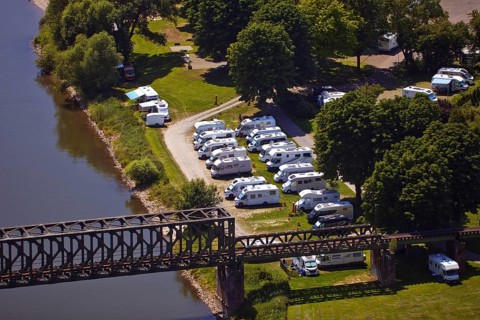 Elevated view from Eckberg to a motorhome parking area on the River Weser, Bodenwerder,