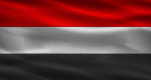 Yemen flag with fabric texture. Realistic flag of Yemen waving